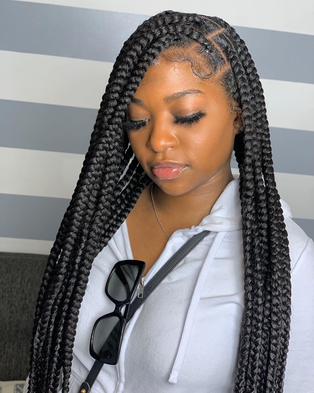 jumbo knotless box braids protective hairstyle black women style rave