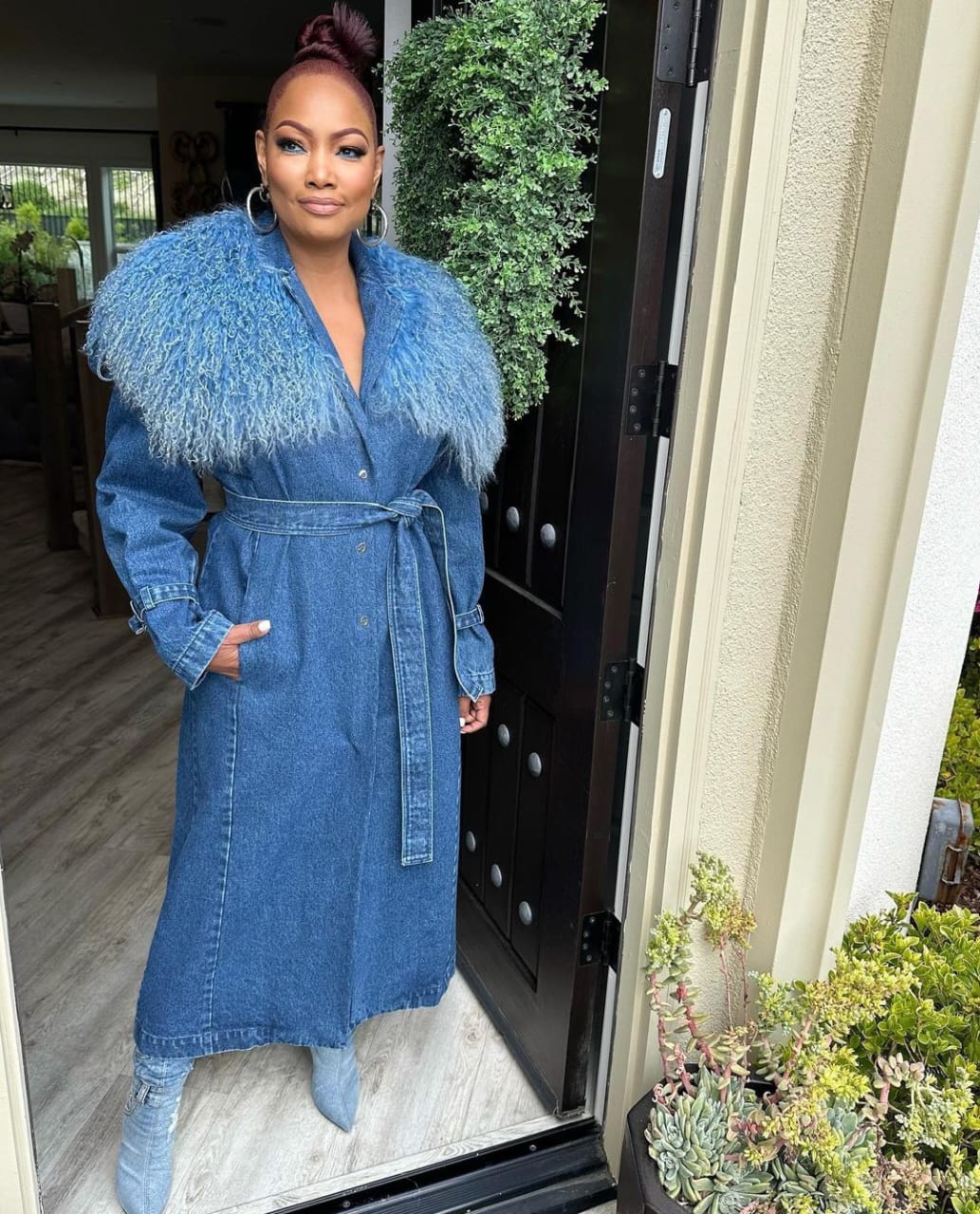 Garcelle on denim fur coat