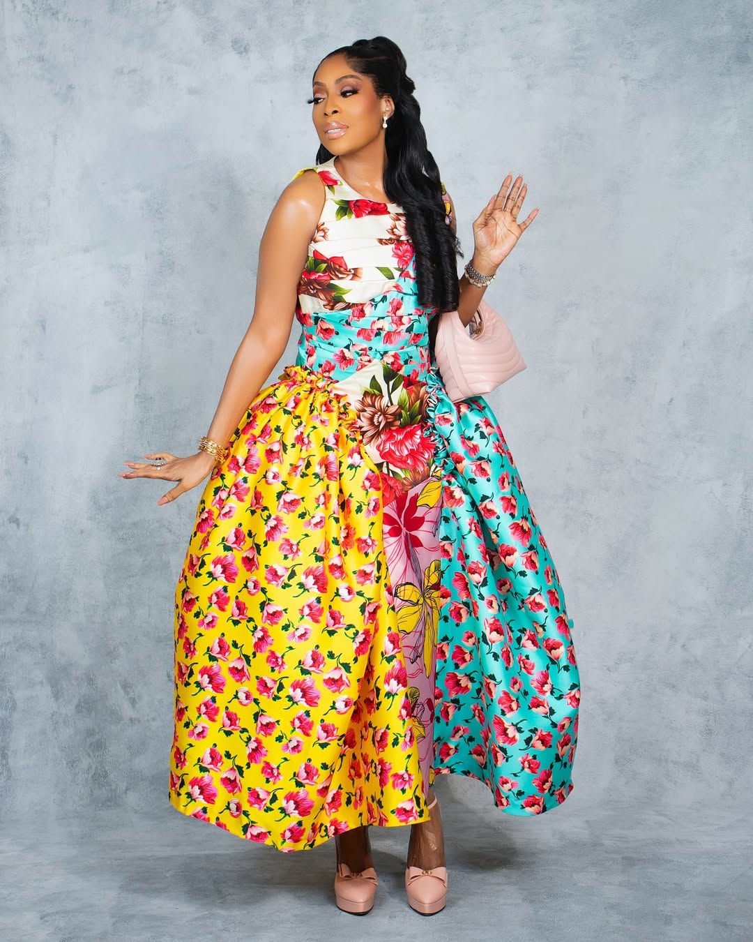 mo abudu wears a floral dress