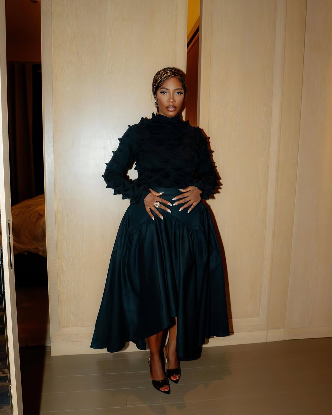 Tiwa Savage in Black Spikey Top and Black Circle Skirt Stylish Lagos Girls