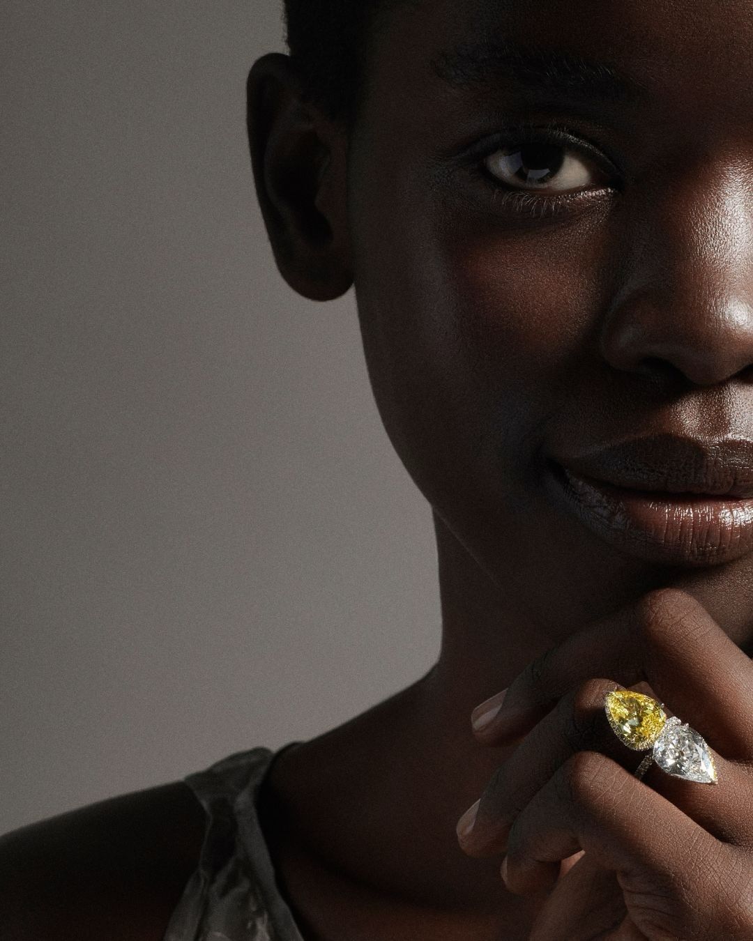 Black woman wears toi et moi engagement ring trends