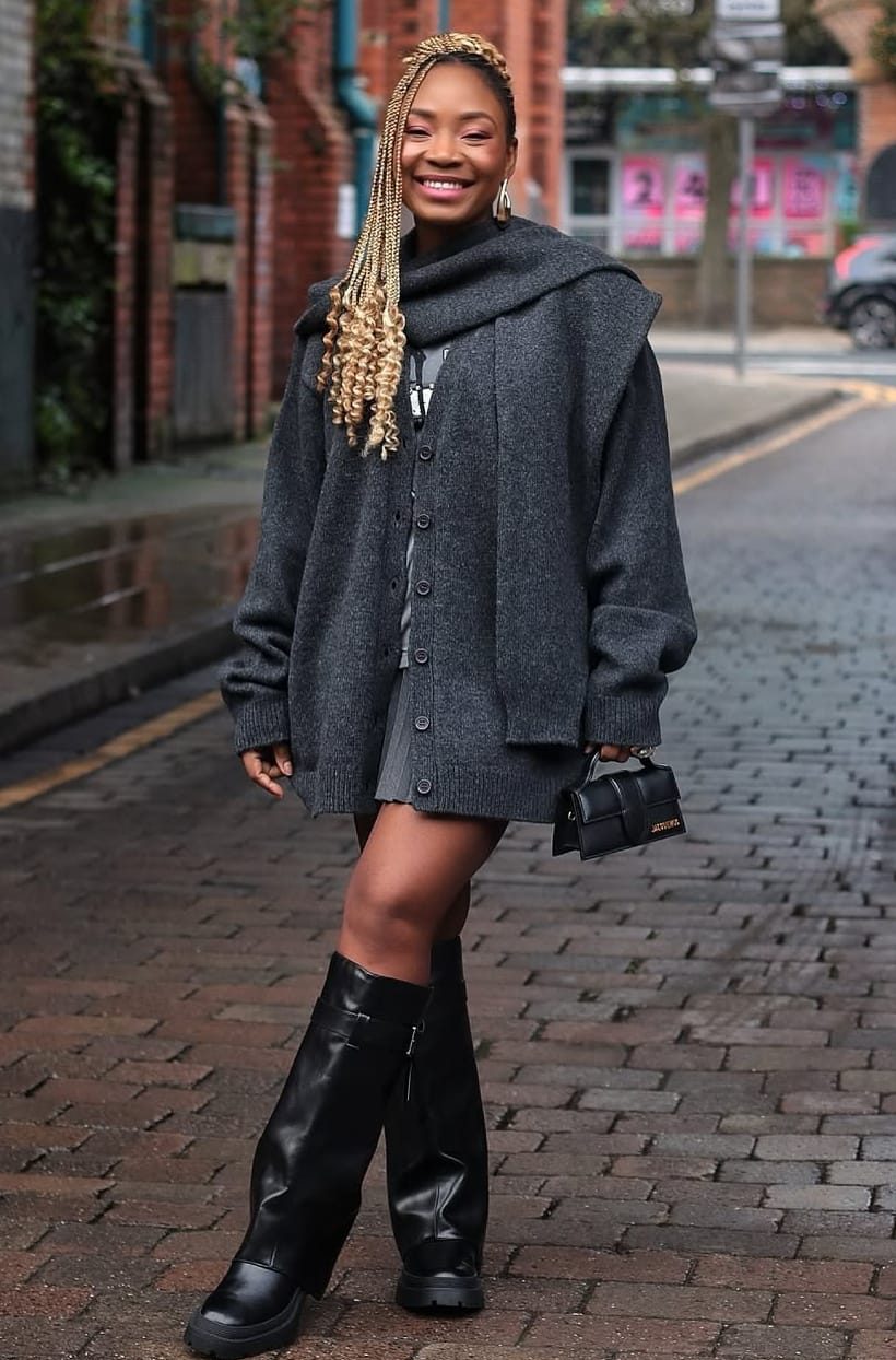 woman wearing grey wool cardigan with boots