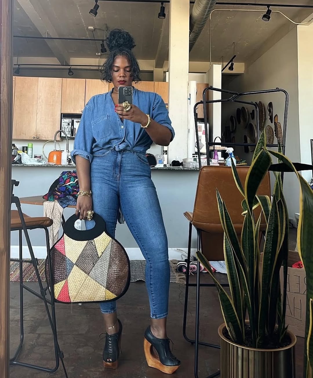 woman wearing skinny jeans with denim shirt