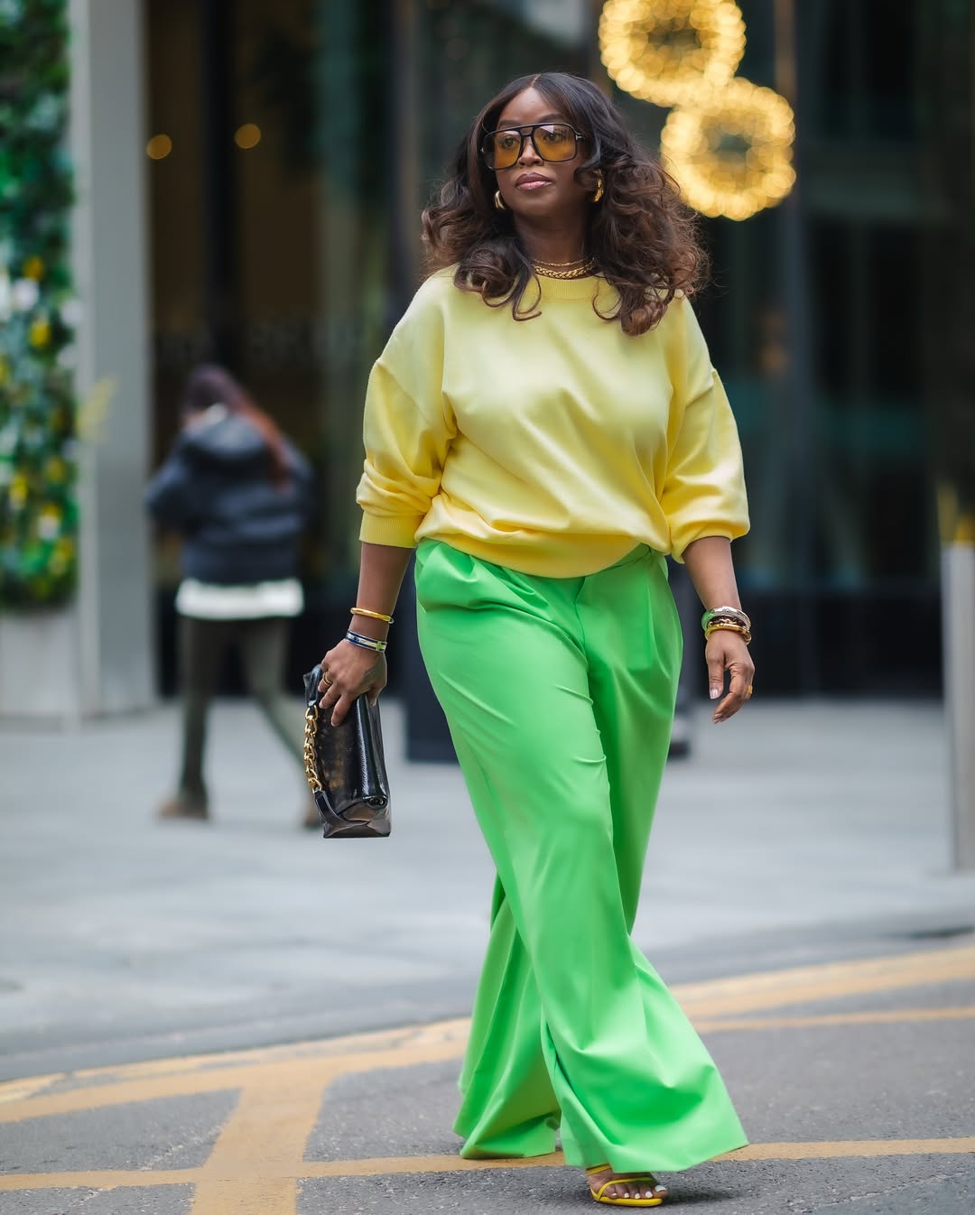 woman wearing baggy pants and sweater