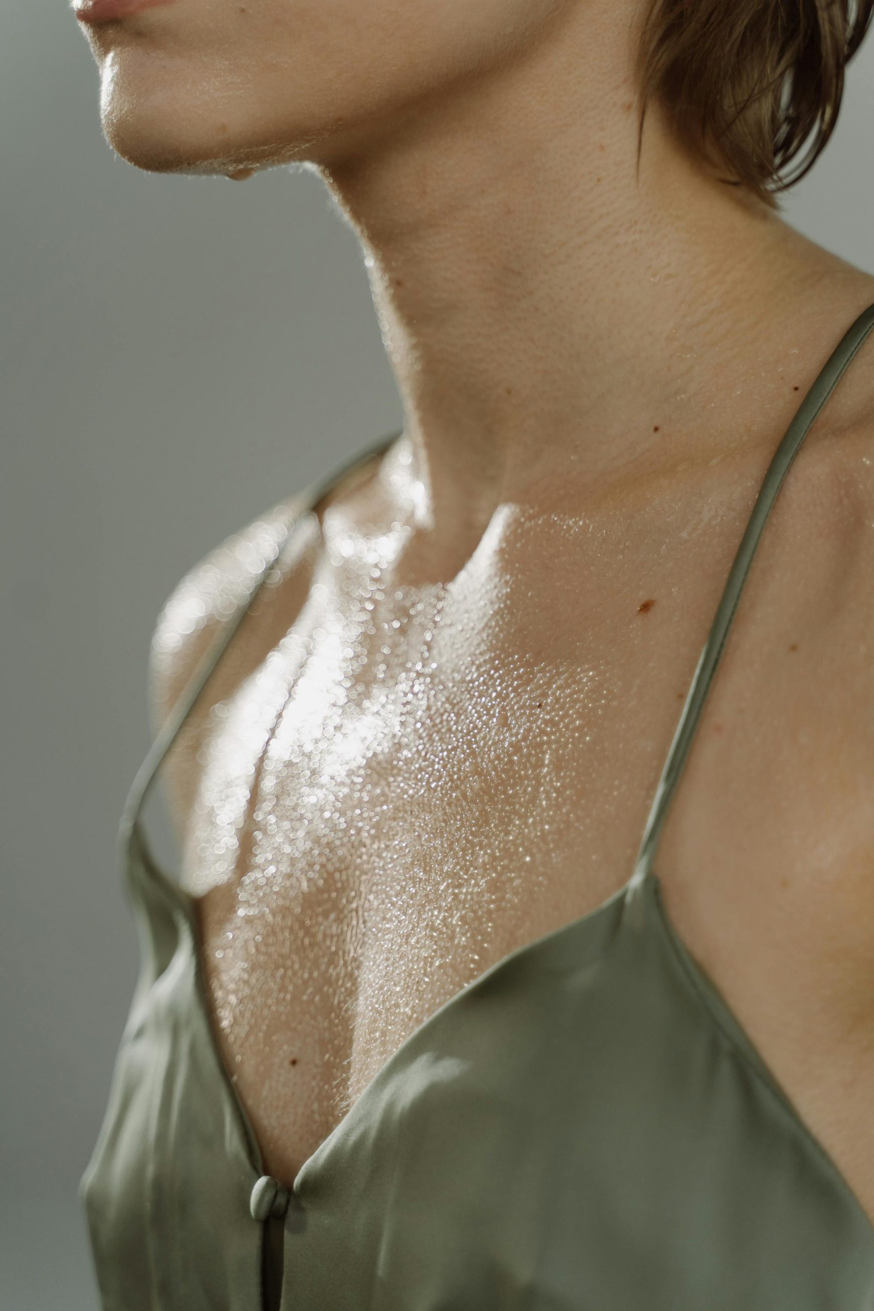 close up shot of woman body sweating wash